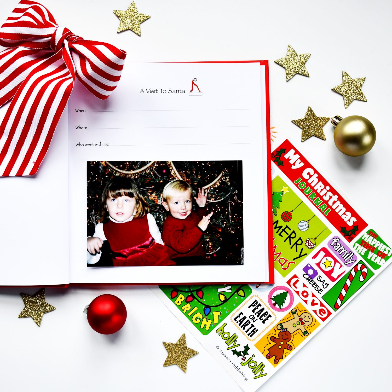 Red kids christmas journal with open page and props