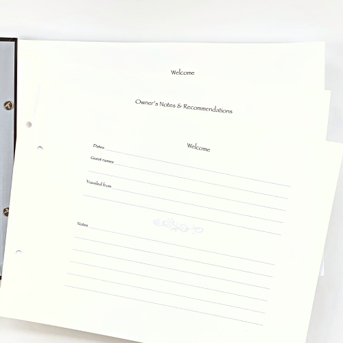 Vacation House Guest Book pages shown open in memory book