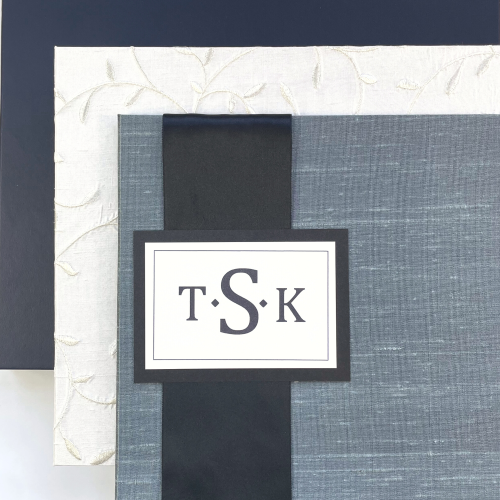 satin guest book with black satin bow and monogram name plaque