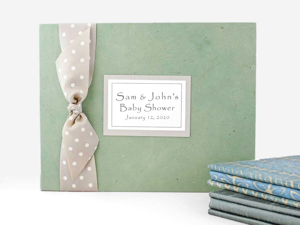Seafoam paper cover with grey dot ribbon and plaque