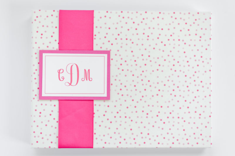 Memory Book with pink dots and hot pink ribbon on a white background