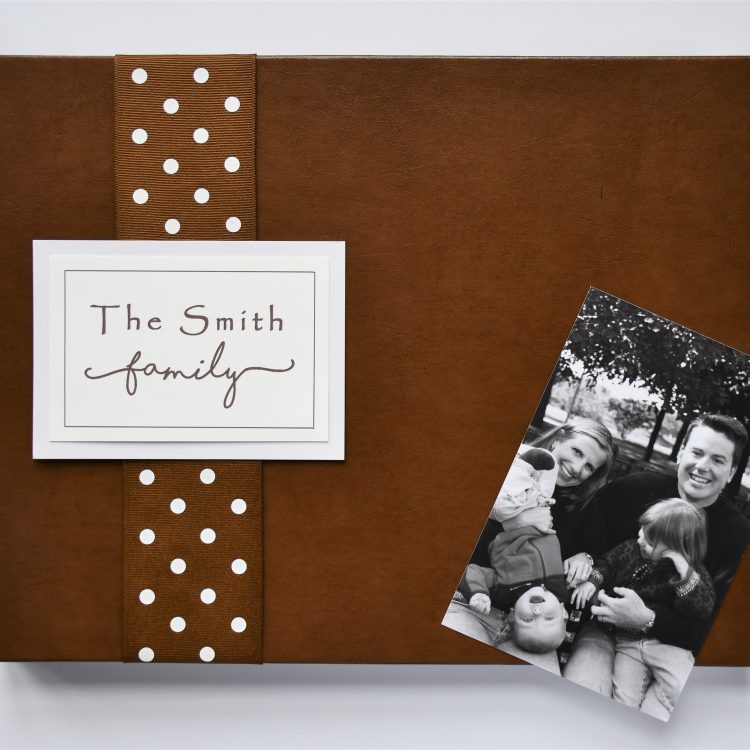 Brown leather favorite memories book with brown polka dot ribbon and plaque