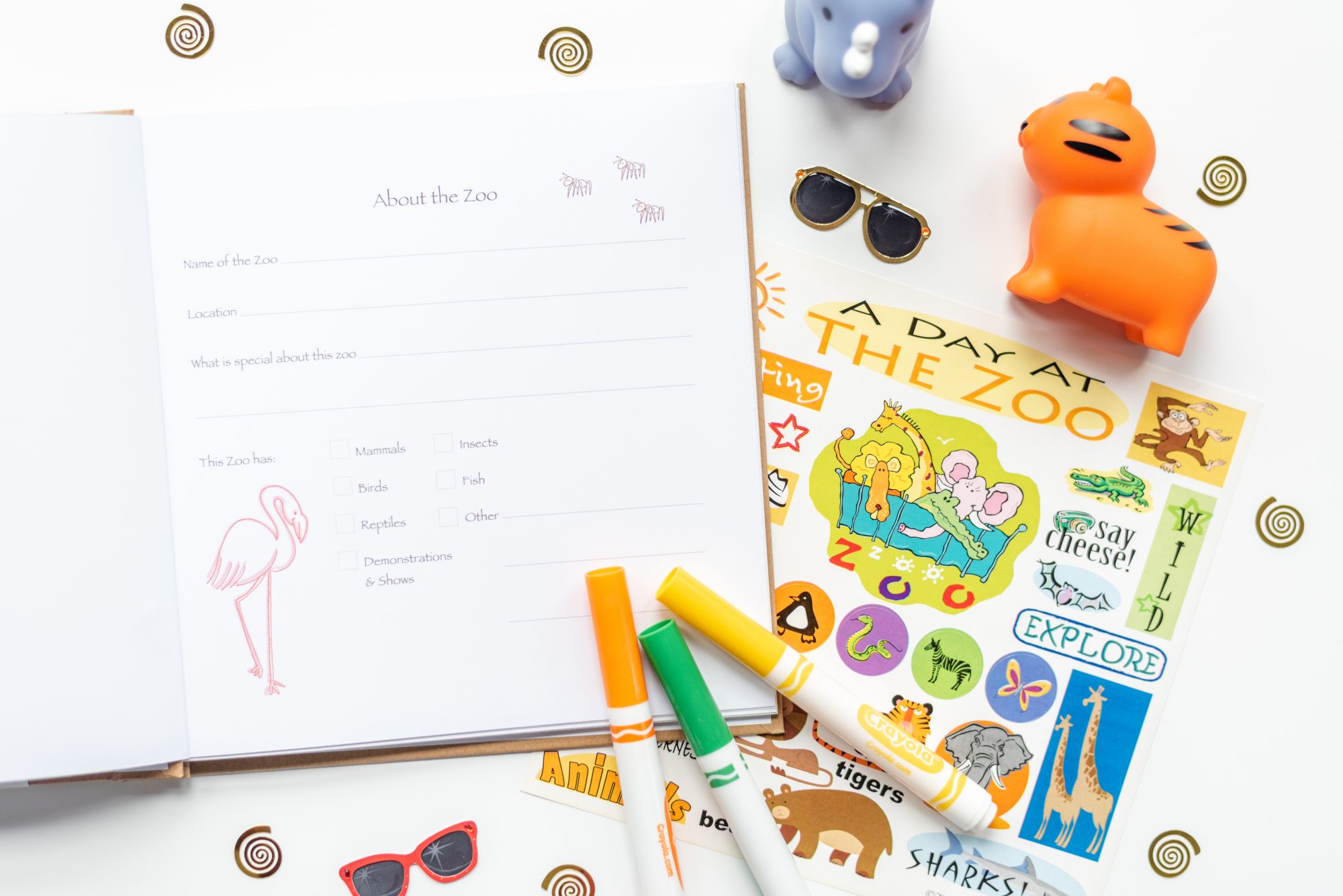 Zoo kids journal with open page, sticker sheet and props