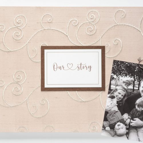 Our Love Story Memory Book featured with plaque and props