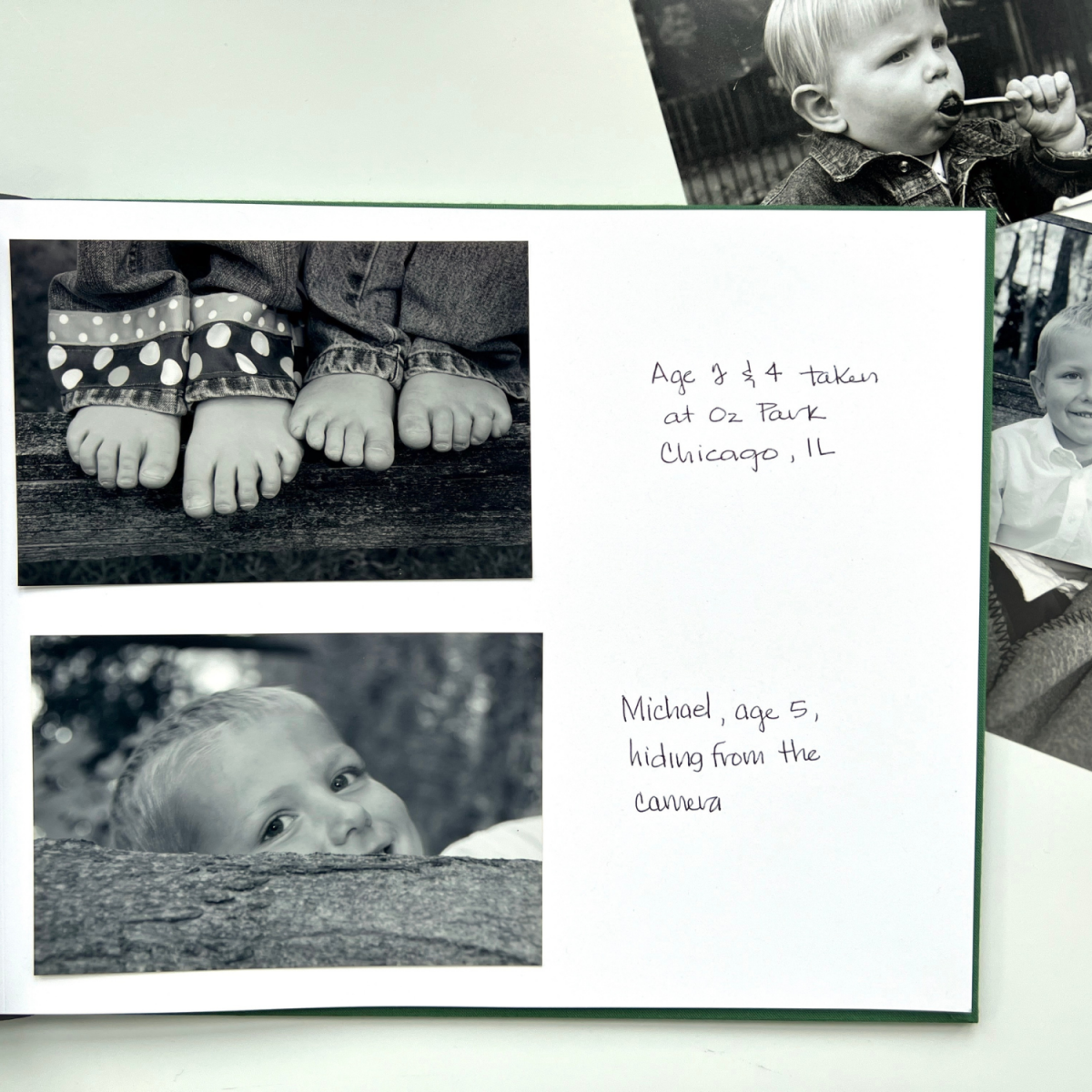 Tessera Blank Memory Book with open page and photo props