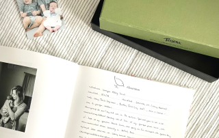 open page of baby memory book with writing shown with tessera box